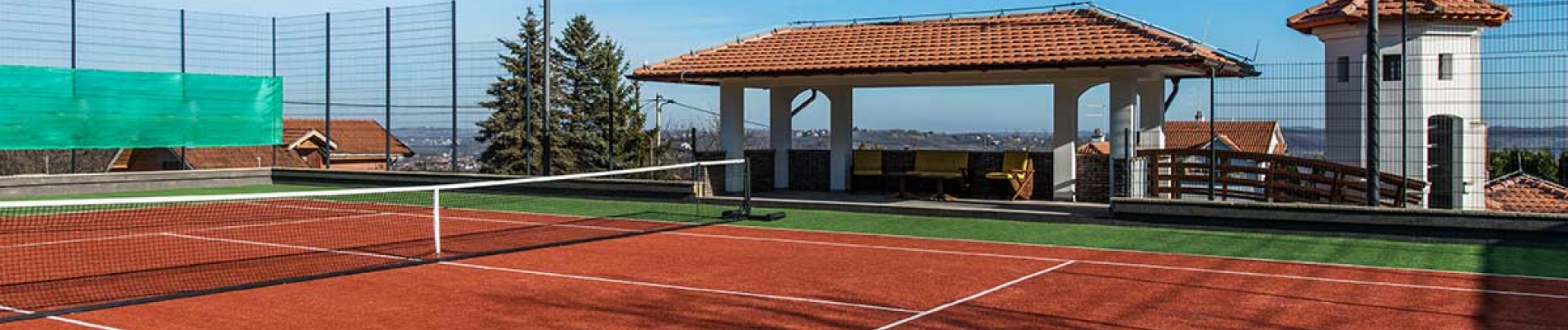 La Construction d'un Terrain de Tennis en Gazon Artificiel